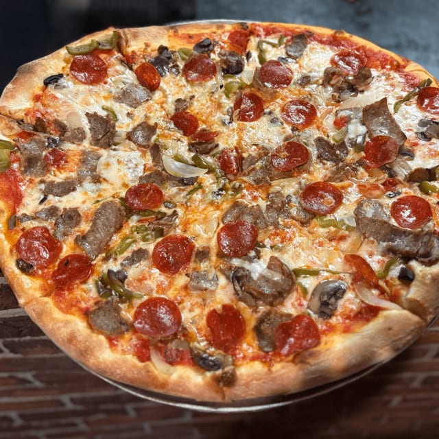 Carmelas Works Pizza.